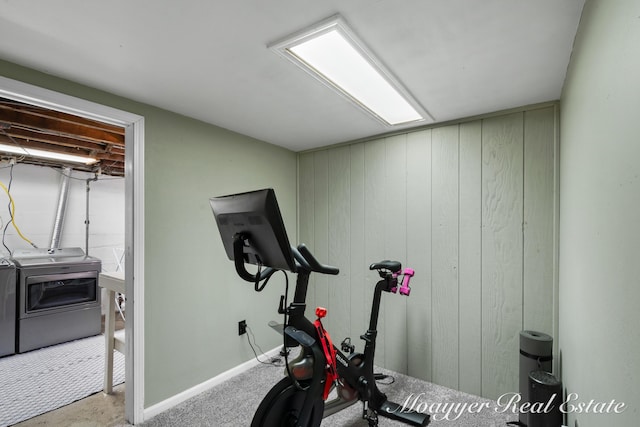 workout area with washer and clothes dryer