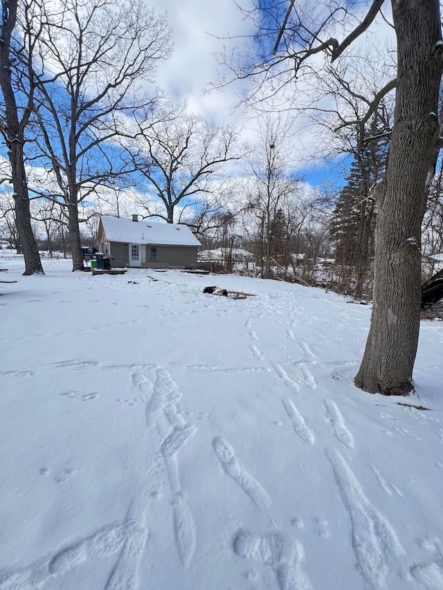 view of yard covered in snow