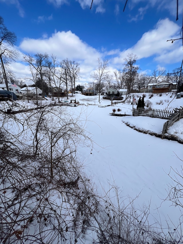 view of yard covered in snow