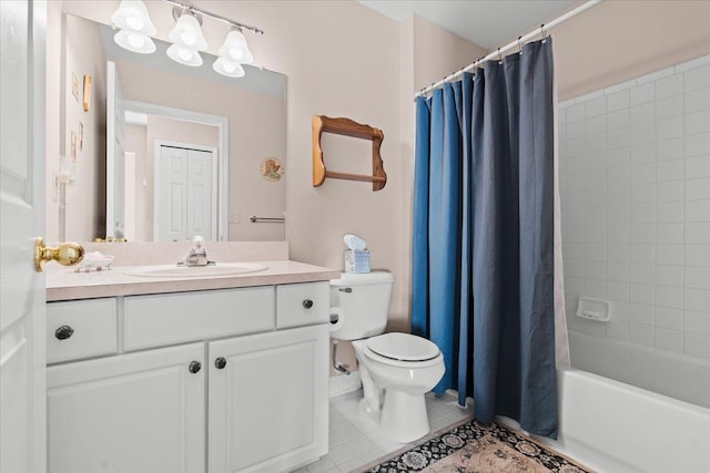 full bathroom with shower / tub combo, vanity, tile patterned flooring, and toilet