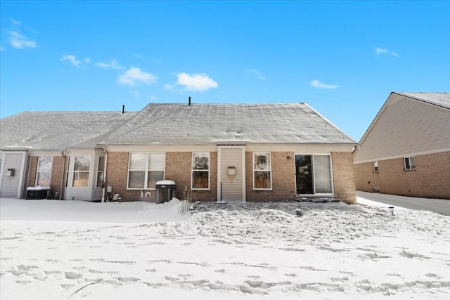 view of snow covered property