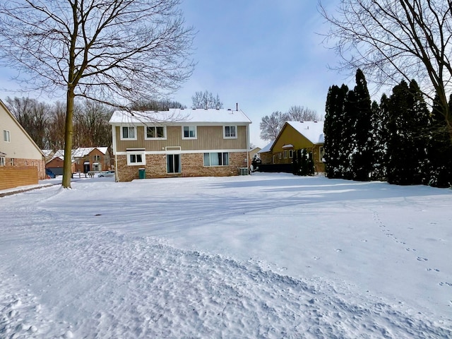 view of front of property featuring brick siding