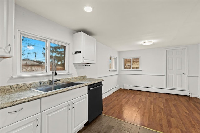 kitchen with dishwasher, a baseboard heating unit, dark wood-style flooring, and a sink