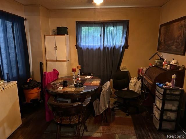 dining room with dark hardwood / wood-style floors