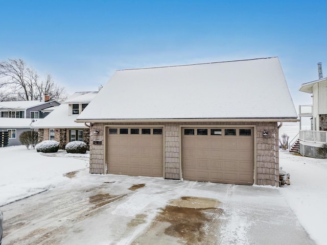 exterior space with a garage