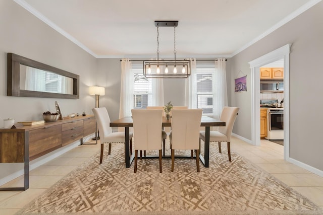 dining space with ornamental molding and light tile patterned floors