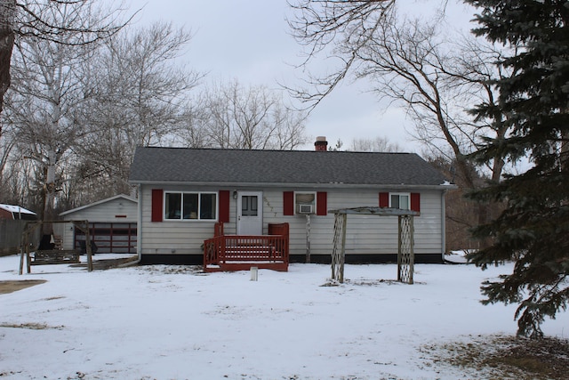 ranch-style house featuring cooling unit