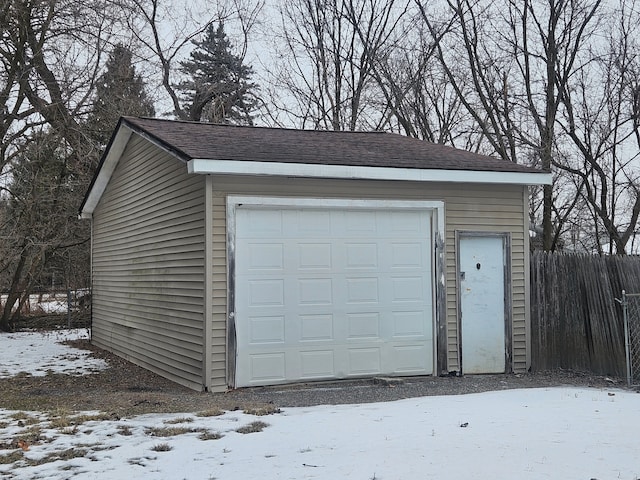 view of snow covered garage