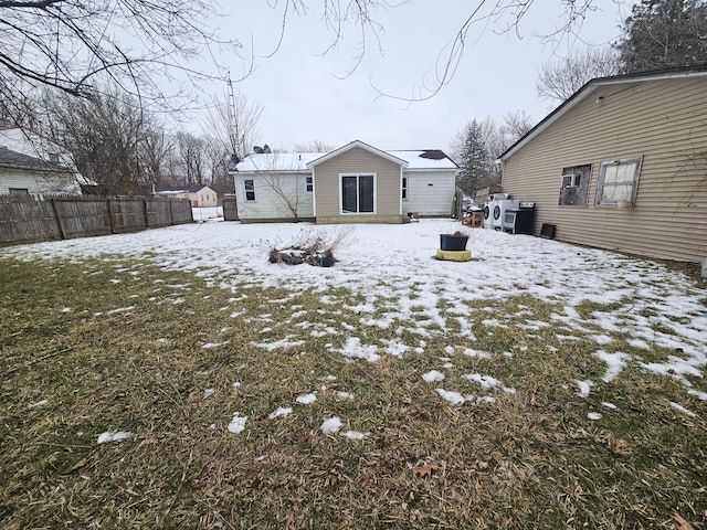 view of snow covered house