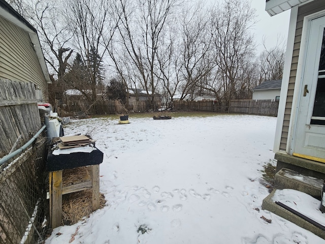 view of yard covered in snow