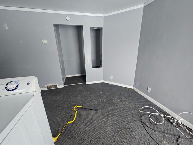 interior space with washer / clothes dryer