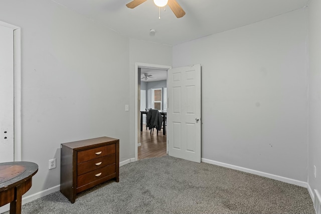 bedroom with light carpet and ceiling fan