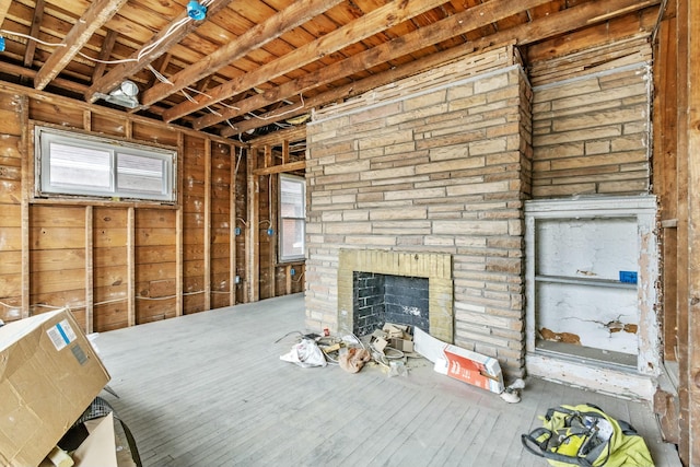 unfurnished living room featuring a fireplace