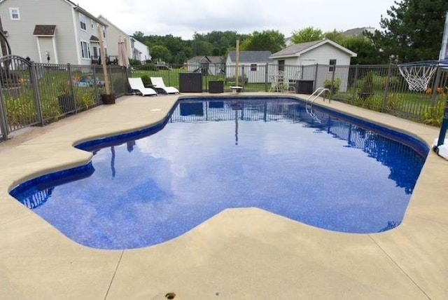 view of pool featuring a patio area