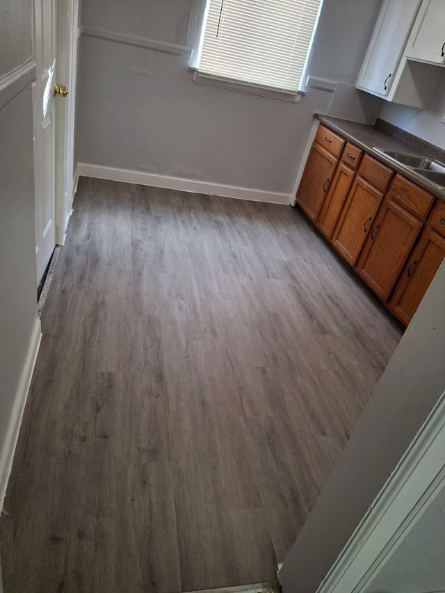 kitchen with sink and light wood-type flooring