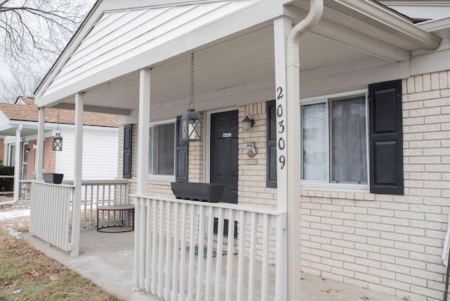 entrance to property with a porch