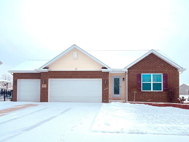 ranch-style house featuring a garage