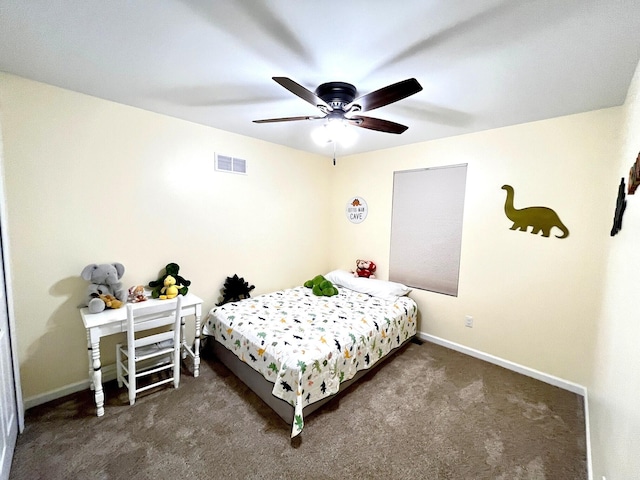 bedroom featuring ceiling fan and dark colored carpet