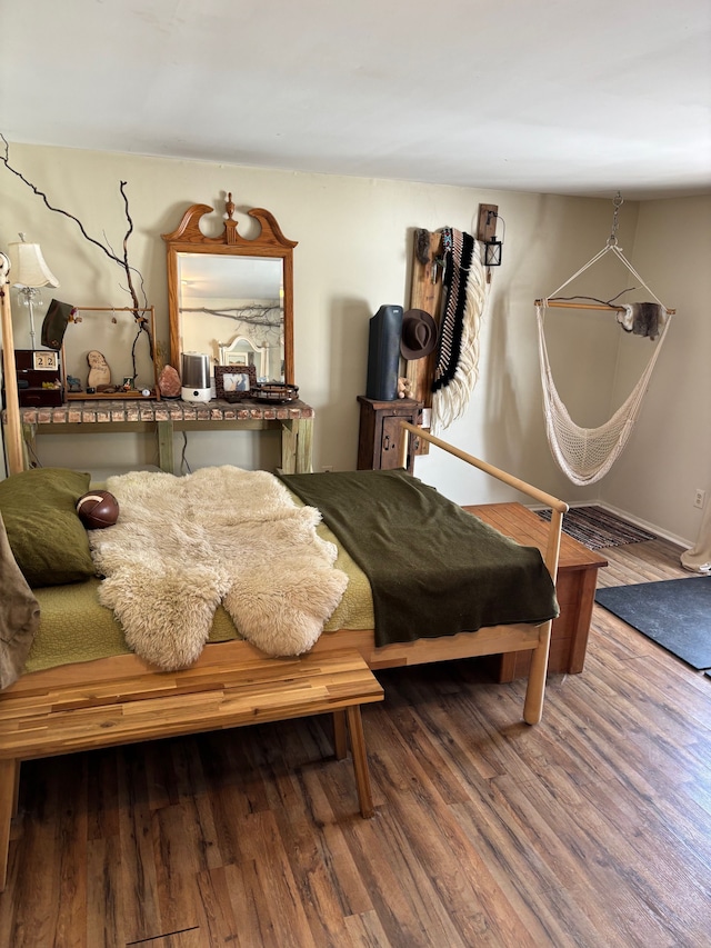 bedroom featuring hardwood / wood-style floors