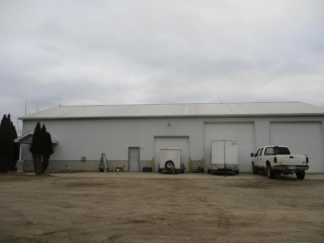 view of outbuilding featuring a garage