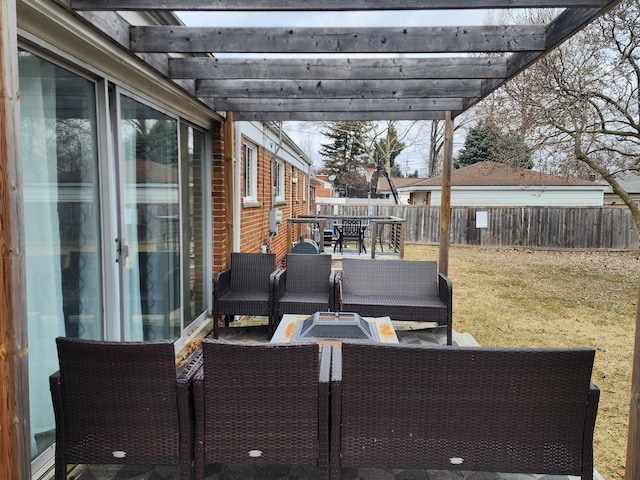 view of patio / terrace with outdoor dining area, fence, a pergola, and an outdoor hangout area