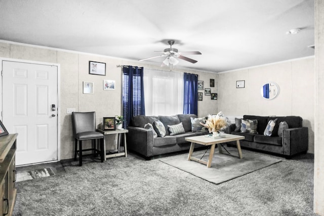 carpeted living room featuring crown molding and ceiling fan