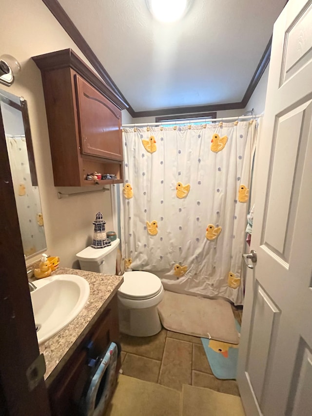 bathroom with vanity, ornamental molding, toilet, and walk in shower