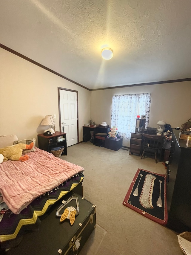 bedroom featuring crown molding, vaulted ceiling, carpet floors, and a textured ceiling