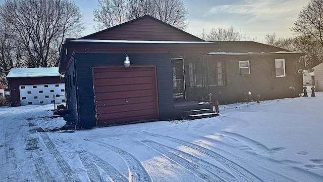 view of front of home featuring brick siding