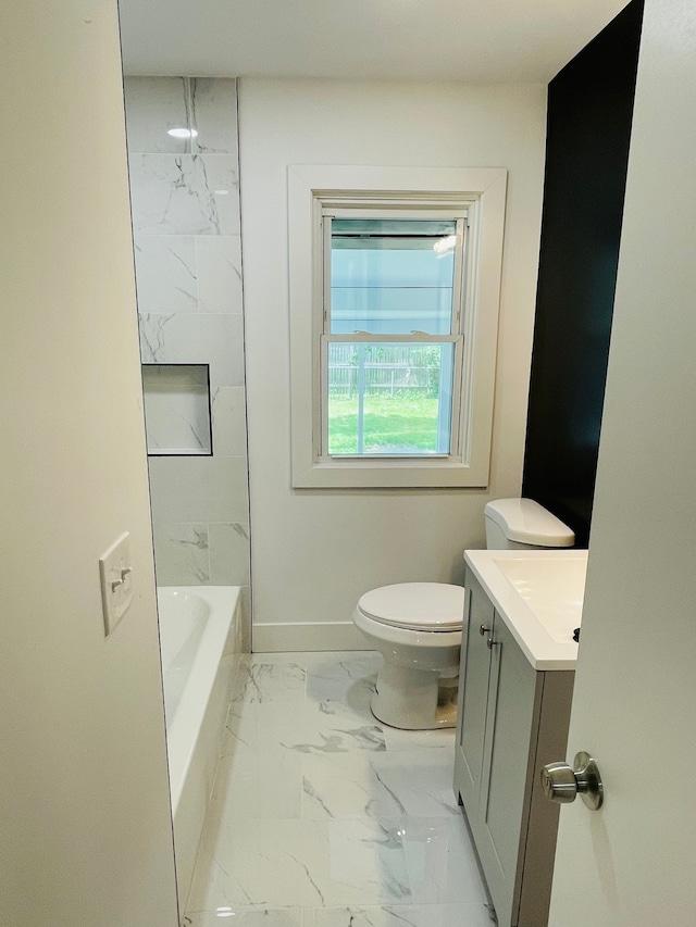 full bath with toilet, vanity, baseboards, marble finish floor, and tub / shower combination