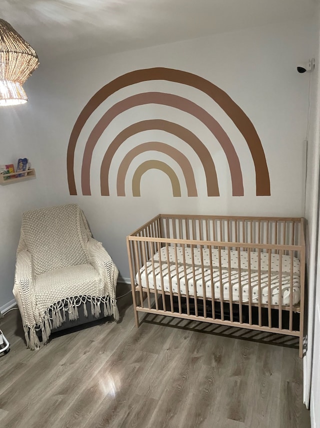 bedroom featuring hardwood / wood-style floors