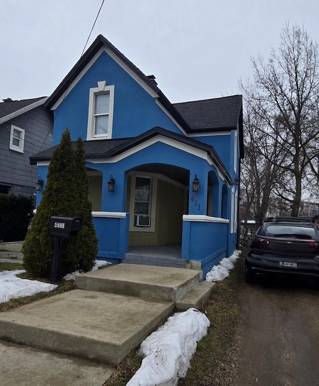 view of front of property featuring covered porch