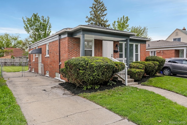 8679 Burt Rd, Detroit, MI 48228 - bungalow featuring brick siding and driveway
