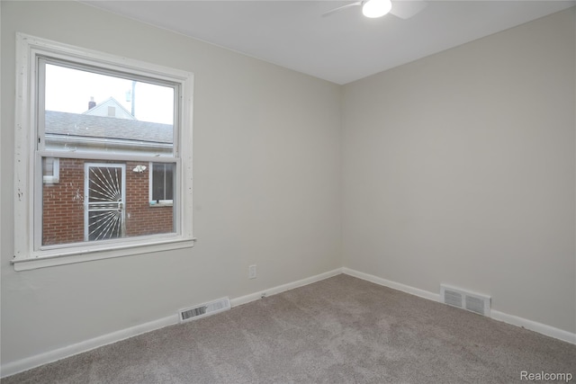 8679 Burt Rd, Detroit, MI 48228 - carpeted spare room with ceiling fan and baseboards