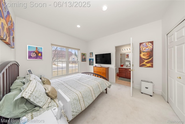 37143 Southwind Ct Unit 38, Farmington Hills, MI 48331 - bedroom with light colored carpet, recessed lighting, baseboards, and ensuite bath