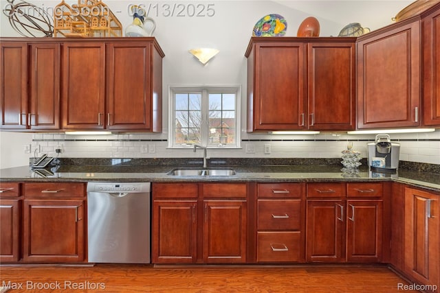 37143 Southwind Ct Unit 38, Farmington Hills, MI 48331 - kitchen featuring stainless steel dishwasher, a sink, backsplash, wood finished floors, and dark stone counters