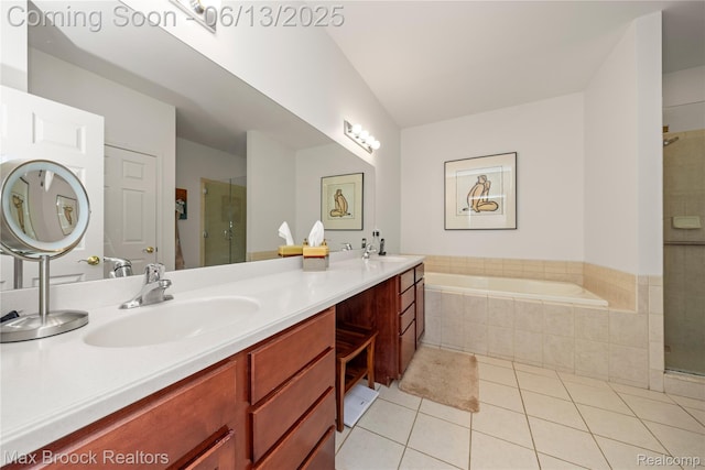 37143 Southwind Ct Unit 38, Farmington Hills, MI 48331 - bathroom with tile patterned flooring, double vanity, a stall shower, and a bath