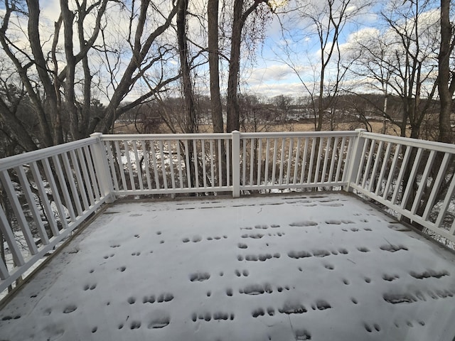 view of snow covered deck