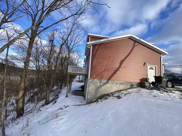 view of snow covered property