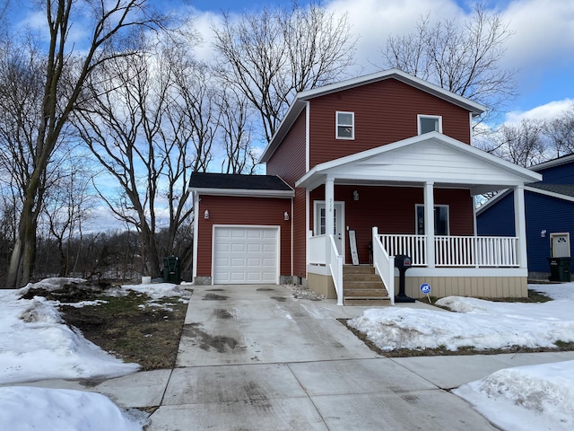 view of front of home with a porch and a garage