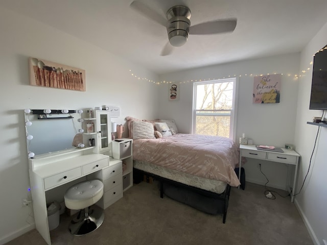 bedroom with ceiling fan and carpet flooring