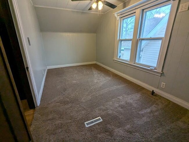 bonus room with ceiling fan, lofted ceiling, and carpet floors