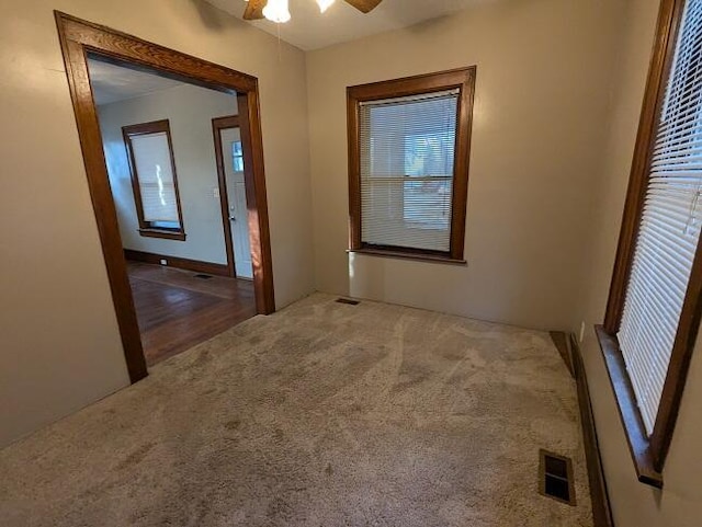 corridor featuring carpet flooring