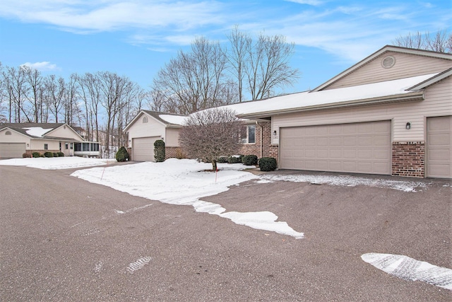 ranch-style home with a garage