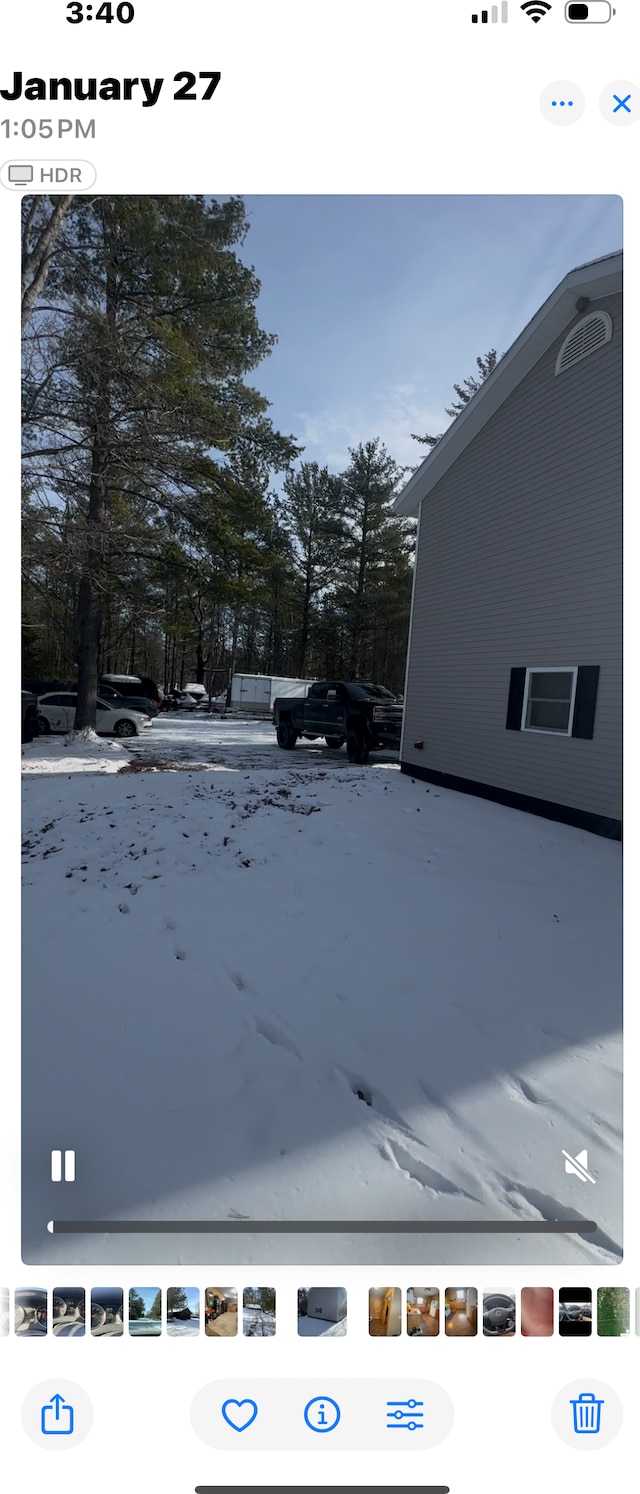 view of yard covered in snow