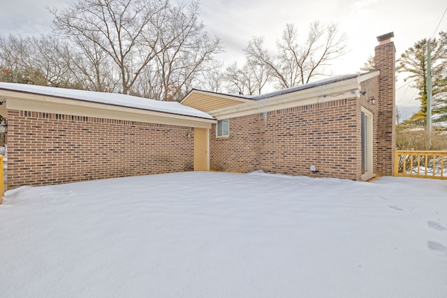 view of snow covered property