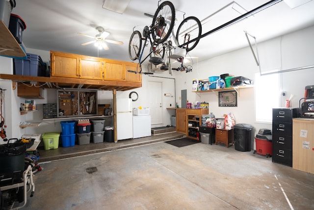 garage with ceiling fan, refrigerator, and white fridge