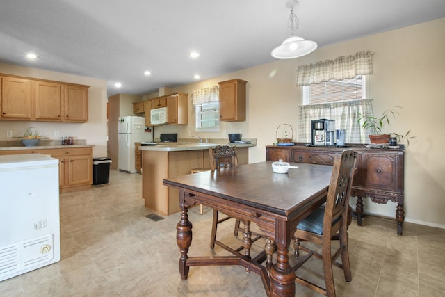 dining space with sink