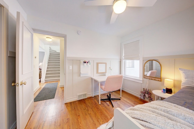 bedroom featuring light wood-type flooring and ceiling fan