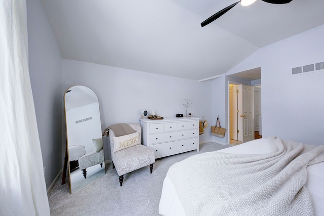 bedroom with lofted ceiling, light colored carpet, and ceiling fan